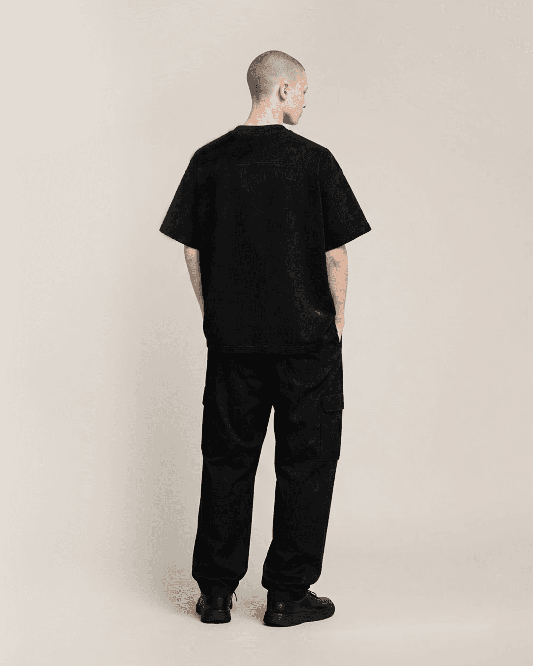 Back view of the Core Tee in Black Onyx, worn oversized